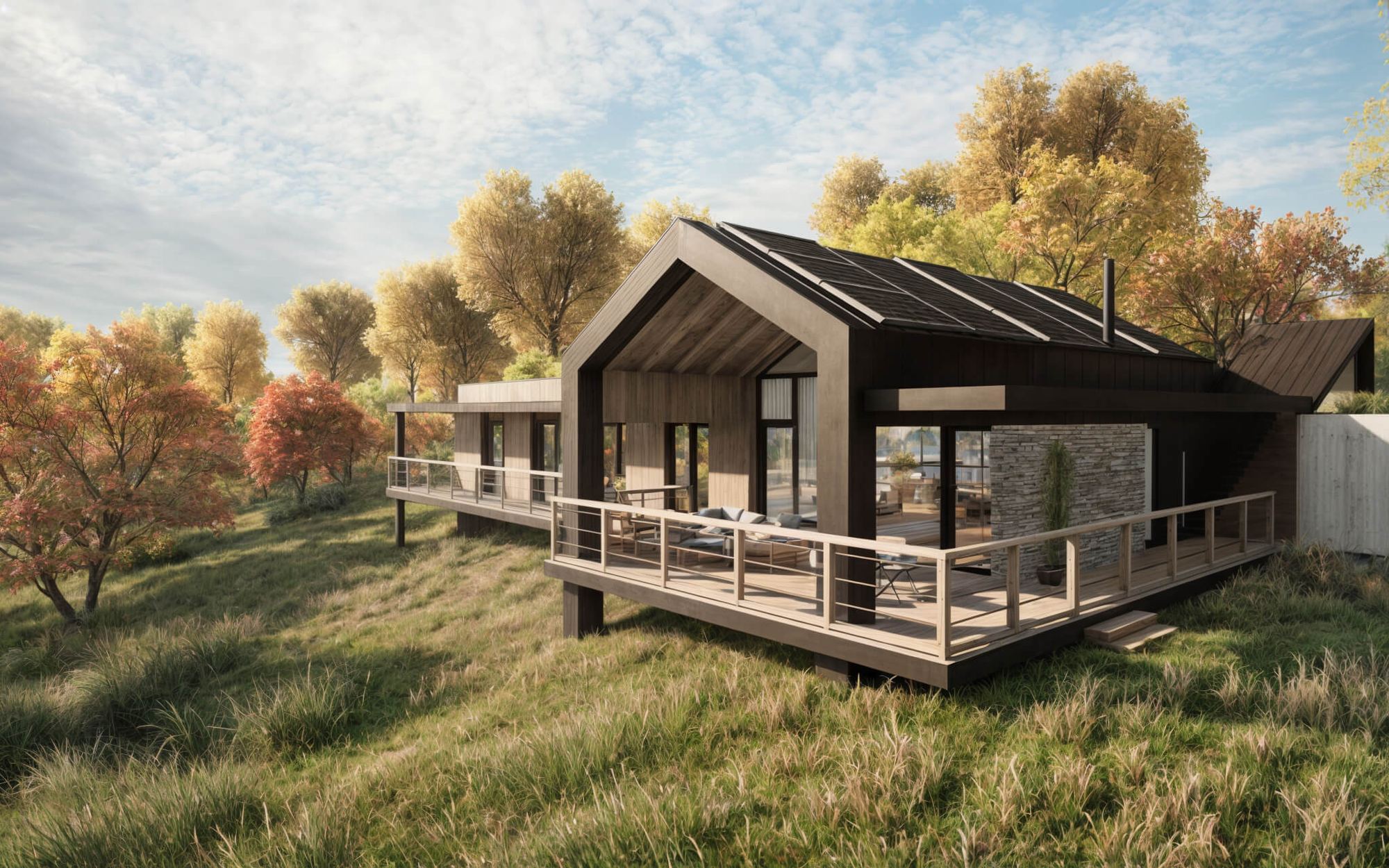 Bergchalet Off-grid auf Holzstelzen mit Satteldach, umlaufender Holzterrasse und Steinkamin im herbstlichen Hang